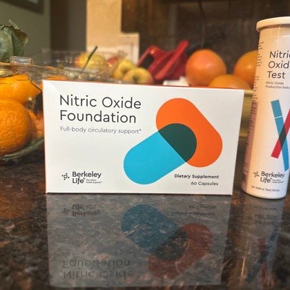 Kelly M.'s kitchen counter: the Nitric Oxide box beside a tube of saliva test strips.